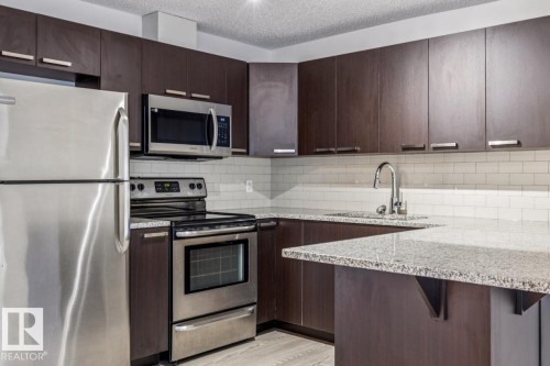 223 14808 125 Street, Edmonton, AB - Indoor Photo Showing Kitchen With Upgraded Kitchen