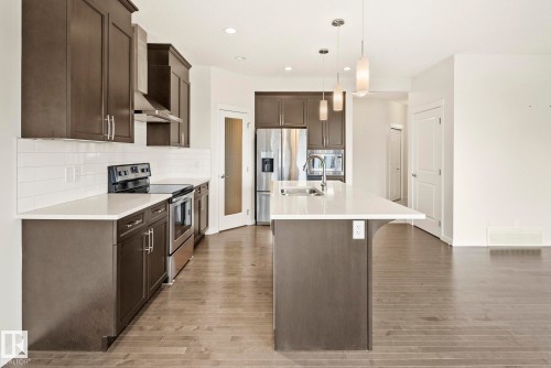 5404 22 Avenue, Edmonton, AB - Indoor Photo Showing Kitchen With Stainless Steel Kitchen With Double Sink With Upgraded Kitchen