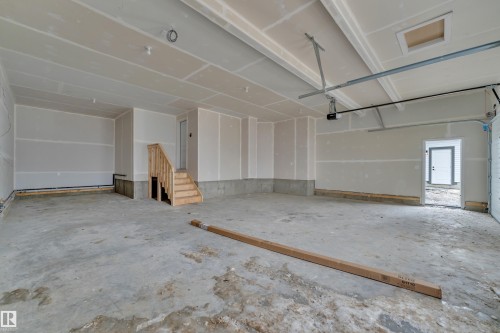 View of garage - 202 Basin Court, Leduc, AB - Indoor Photo Showing Garage