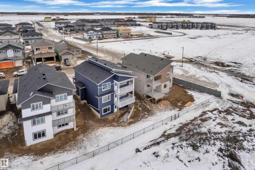 View of snowy aerial view - 202 Basin Court, Leduc, AB - Outdoor With View