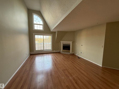 610 3 Perron Street, St. Albert, AB - Indoor With Fireplace