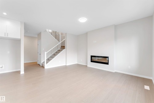 17839 7 St, Edmonton, AB - Indoor Photo Showing Other Room With Fireplace