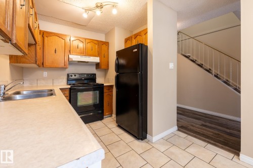 Edmonton, AB - Indoor Photo Showing Kitchen With Double Sink