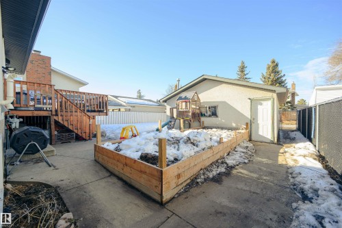 Backyard with raised garden bed - 848 Millbourne Road E, Edmonton, AB - Outdoor With Exterior