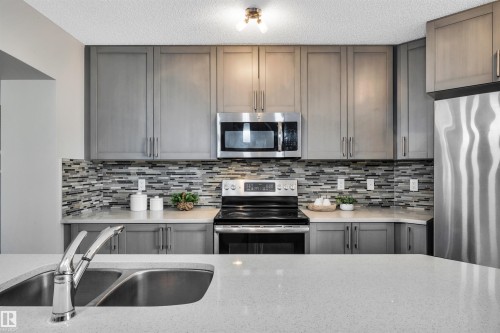 1271 Chappelle Boulevard, Edmonton, AB - Indoor Photo Showing Kitchen With Stainless Steel Kitchen With Double Sink With Upgraded Kitchen