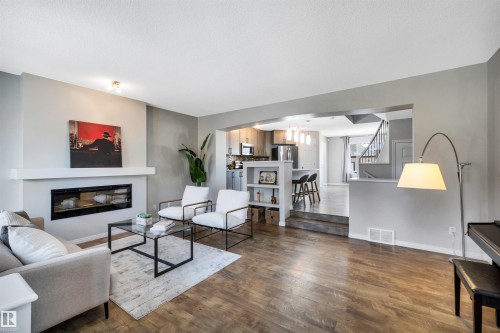 1271 Chappelle Boulevard, Edmonton, AB - Indoor Photo Showing Living Room With Fireplace