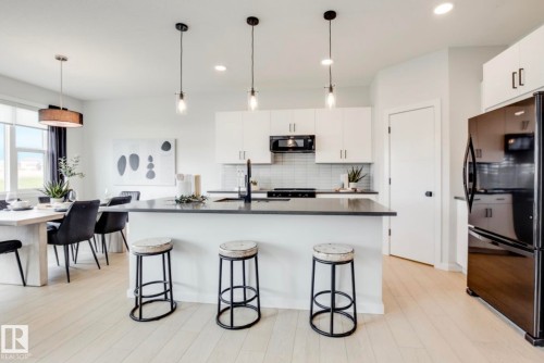 181 Stiles Bend, Leduc, AB - Indoor Photo Showing Kitchen With Upgraded Kitchen