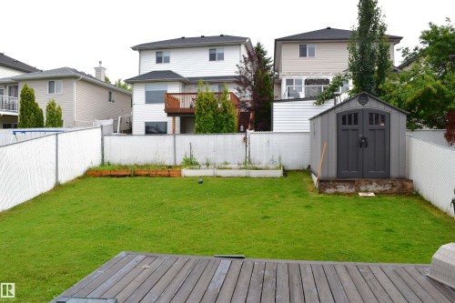 Fenced backyard featuring a shed - 315 Wild Rose Way, Edmonton, AB - Outdoor