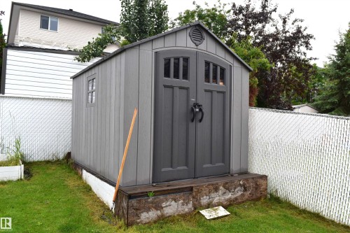 View of shed with a fenced backyard - 315 Wild Rose Way, Edmonton, AB - Outdoor With Exterior