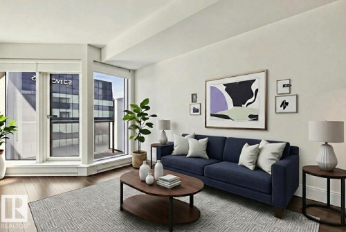 Living area featuring wood finished floors and baseboards - 3104 10360 102 Street, Edmonton, AB - Indoor Photo Showing Living Room