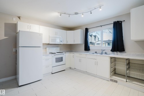 12844 103 Street, Edmonton, AB - Indoor Photo Showing Kitchen With Double Sink