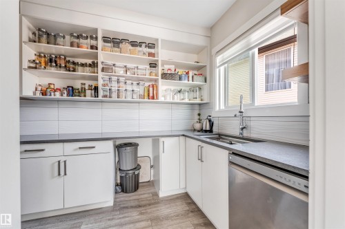 2404 13 Avenue, Edmonton, AB - Indoor Photo Showing Kitchen With Double Sink