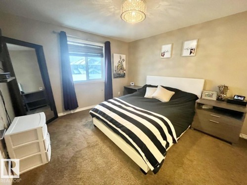 9340 211 Street Nw, Edmonton, AB - Indoor Photo Showing Bedroom