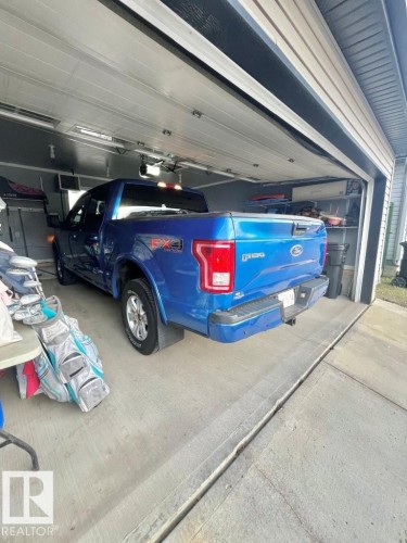9340 211 Street Nw, Edmonton, AB - Indoor Photo Showing Garage