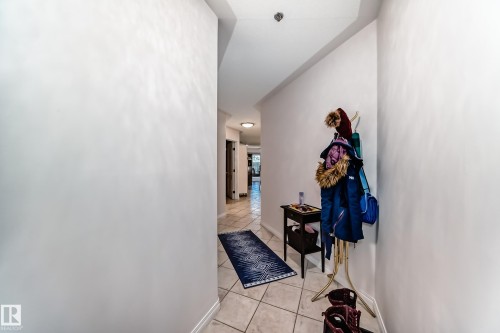 Hall to entry way - 108 12028 103 Avenue, Edmonton, AB - Indoor Photo Showing Other Room