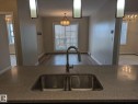 319 1144 Adamson Drive, Edmonton, AB  - Indoor Photo Showing Kitchen With Double Sink 