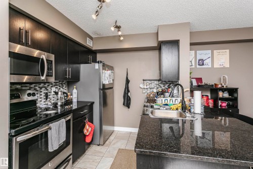 304 274 Mcconachie Dr Nw, Edmonton, AB - Indoor Photo Showing Kitchen With Double Sink