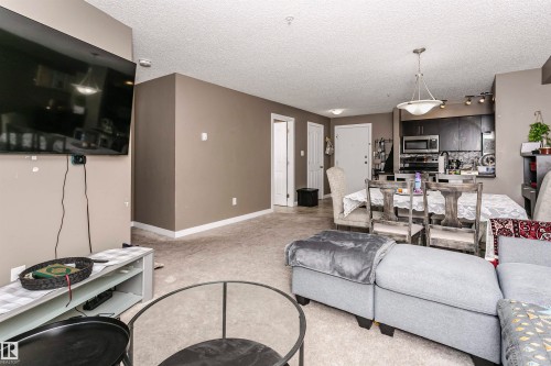 304 274 Mcconachie Dr Nw, Edmonton, AB - Indoor Photo Showing Living Room