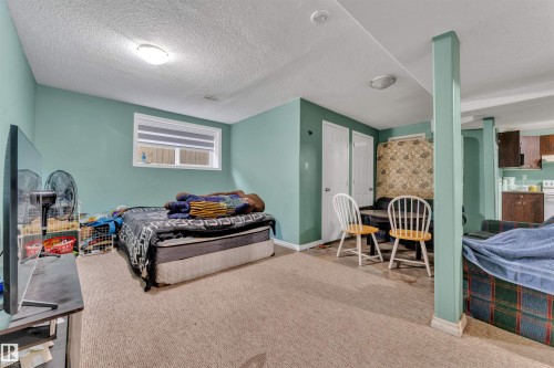 3307 24 Av, Edmonton, AB - Indoor Photo Showing Bedroom