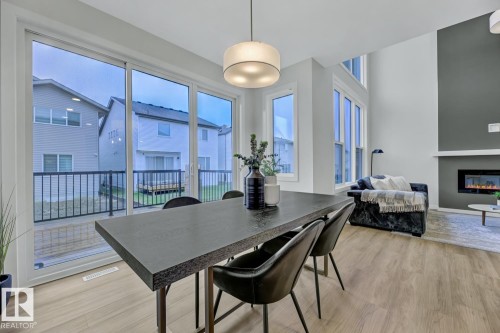 2235 194 Street, Edmonton, AB - Indoor Photo Showing Dining Room With Fireplace