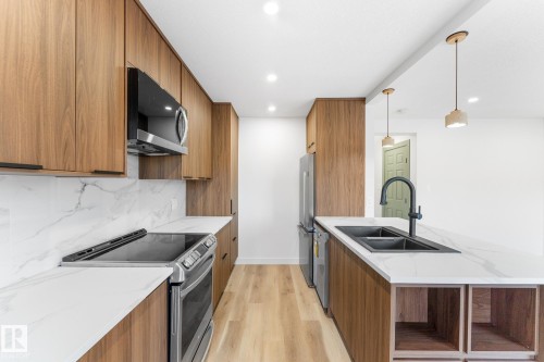 5106 47 Street, Stony Plain, AB - Indoor Photo Showing Kitchen With Double Sink