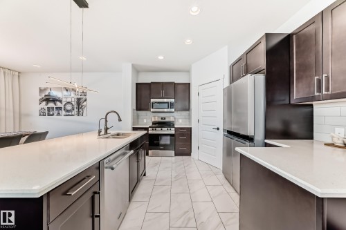 7797 Getty Wynd, Edmonton, AB - Indoor Photo Showing Kitchen With Stainless Steel Kitchen With Double Sink With Upgraded Kitchen