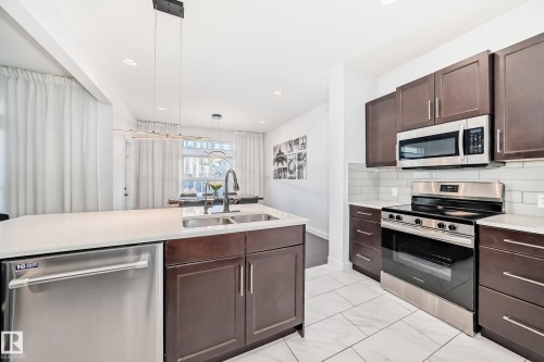 7797 Getty Wynd, Edmonton, AB - Indoor Photo Showing Kitchen With Double Sink