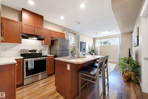 9211 Cooper Crescent, Edmonton, AB - Indoor Photo Showing Kitchen With Double Sink