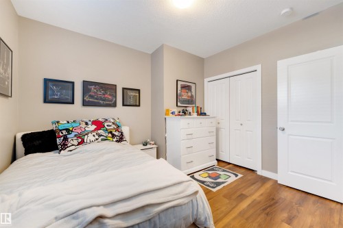 9211 Cooper Crescent, Edmonton, AB - Indoor Photo Showing Bedroom