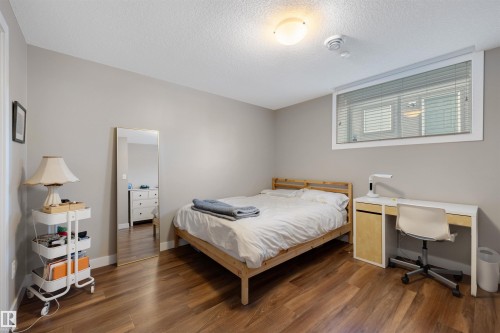 9211 Cooper Crescent, Edmonton, AB - Indoor Photo Showing Bedroom