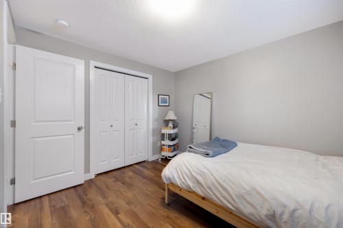 9211 Cooper Crescent, Edmonton, AB - Indoor Photo Showing Bedroom