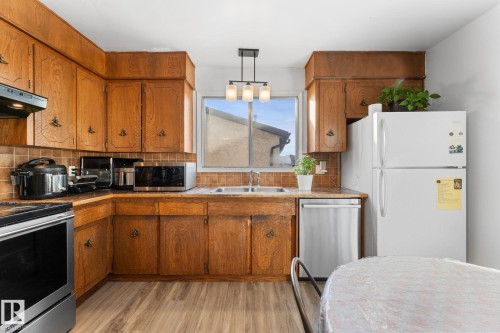 3812 26 Av, Edmonton, AB - Indoor Photo Showing Kitchen With Double Sink