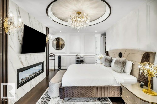 211 Windermere Drive, Edmonton, AB - Indoor Photo Showing Bedroom With Fireplace