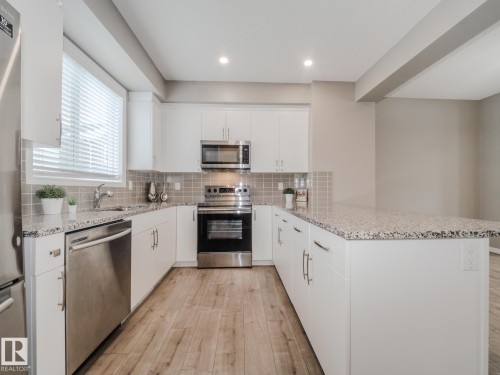 20 2072 Wonnacott Way, Edmonton, AB - Indoor Photo Showing Kitchen With Stainless Steel Kitchen With Upgraded Kitchen