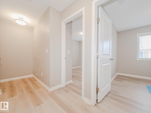 20 2072 Wonnacott Way, Edmonton, AB - Indoor Photo Showing Other Room