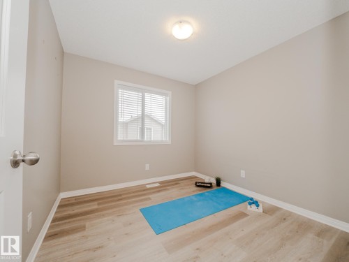 20 2072 Wonnacott Way, Edmonton, AB - Indoor Photo Showing Other Room