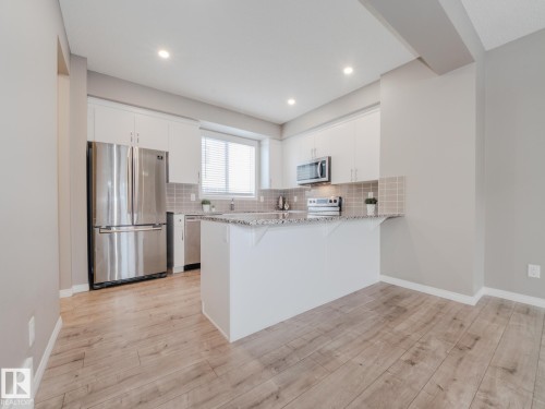 20 2072 Wonnacott Way, Edmonton, AB - Indoor Photo Showing Kitchen With Stainless Steel Kitchen With Upgraded Kitchen