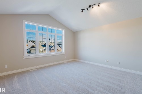 Spare room with light colored carpet - 3612 Mclay Court, Edmonton, AB - Indoor Photo Showing Other Room