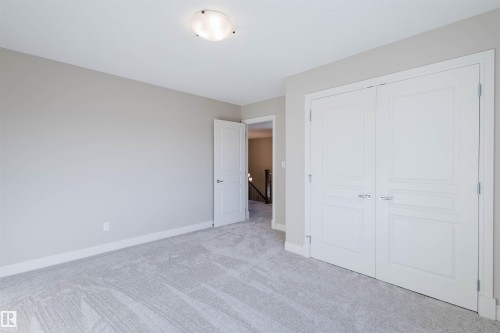 Unfurnished bedroom with carpet and a closet - 3612 Mclay Court, Edmonton, AB - Indoor Photo Showing Other Room