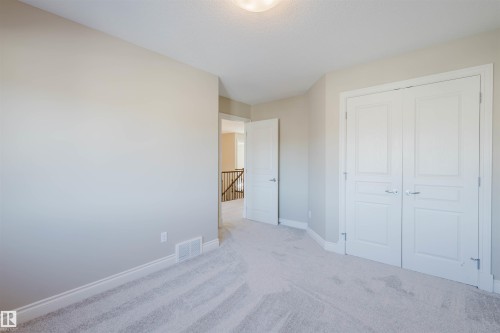 Unfurnished bedroom featuring carpet and a closet - 3612 Mclay Court, Edmonton, AB - Indoor Photo Showing Other Room