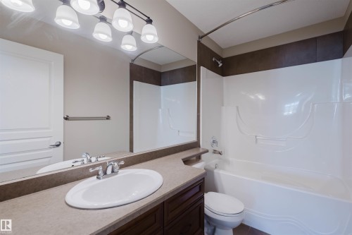 Full bathroom featuring vanity and washtub / shower combination - 3612 Mclay Court, Edmonton, AB - Indoor Photo Showing Bathroom