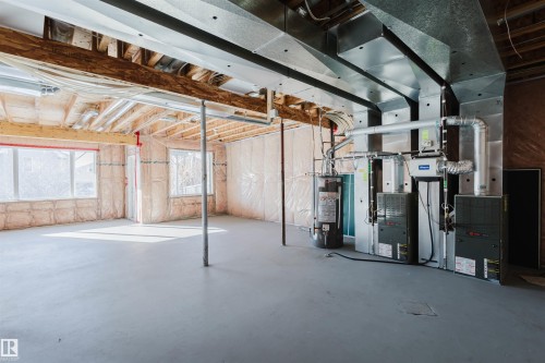 Basement featuring gas water heater - 3612 Mclay Court, Edmonton, AB - Indoor Photo Showing Basement