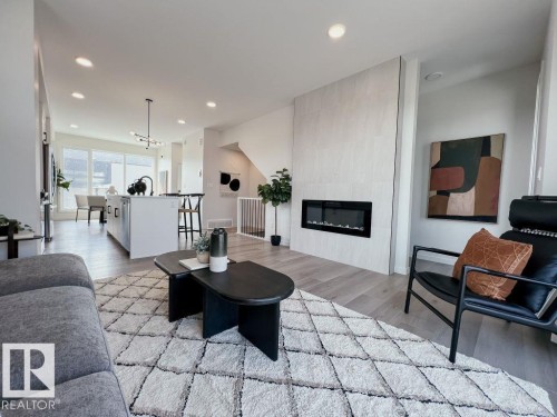 2610 Alces Way, Edmonton, AB - Indoor Photo Showing Living Room With Fireplace