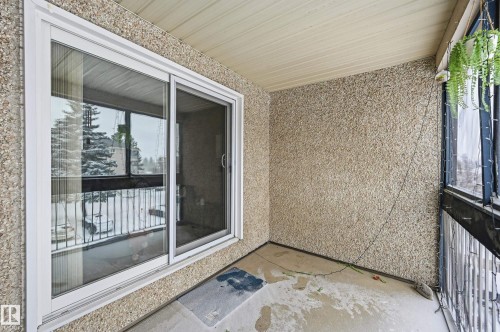 Unfurnished sunroom featuring a balcony - 302 2624 Mill Woods Road E, Edmonton, AB - Outdoor With Exterior
