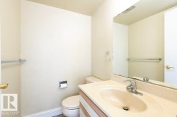 Half bath with vanity and toilet - 