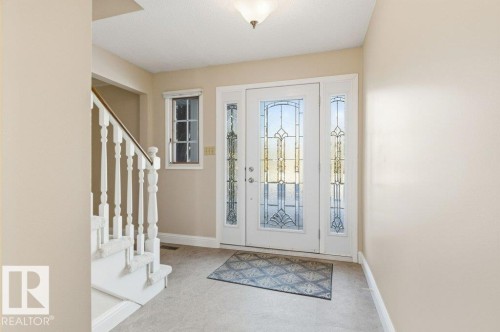 Foyer entrance featuring stairway - 14335 47 Avenue, Edmonton, AB - Indoor Photo Showing Other Room