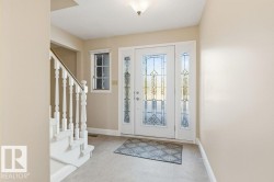 Foyer entrance featuring stairway - 