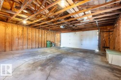 Garage featuring a garage door opener - 