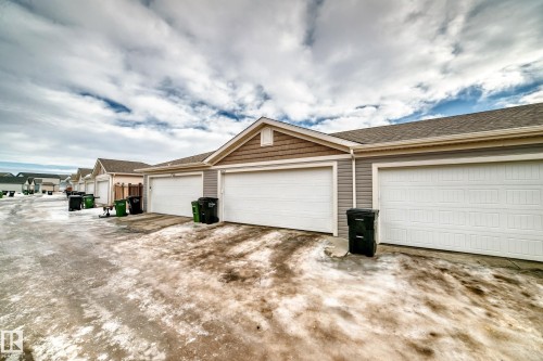Rear lane with concrete pad - 8162 Chappelle Way, Edmonton, AB - Outdoor