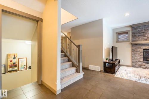 1503 Malone Close, Edmonton, AB - Indoor Photo Showing Other Room With Fireplace